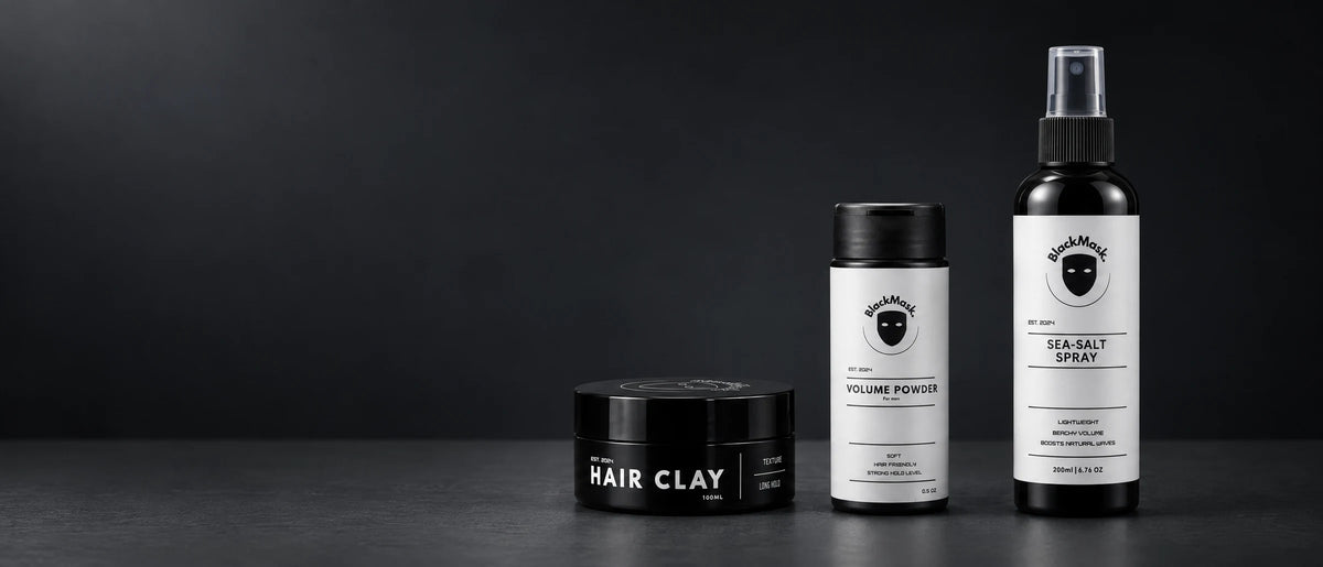 BlackMask Volume Powder, Sea-Salt Spray and Hair Clay on a dark studio surface