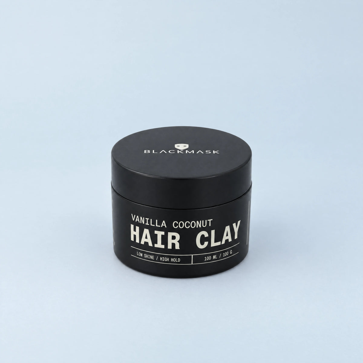 BLACKMASK Hair Clay 100 mL jar with proportions matched to the original product photos, on a pale blue-grey studio background